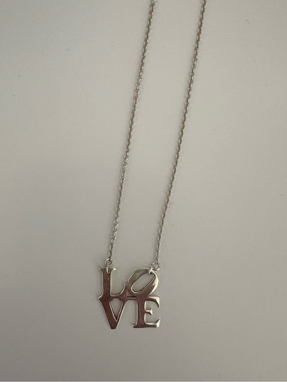 Silver 'LOVE' Pendant Necklace - Women's Silver-tone Necklace